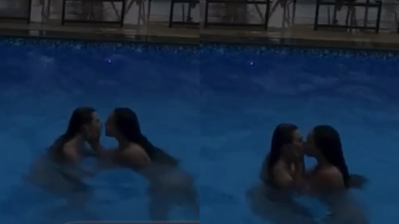 Peoas se beijam na piscina (Foto: Reprodução)